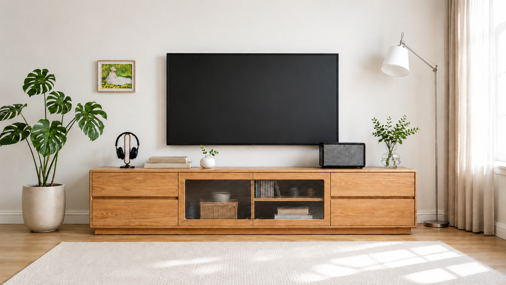 Solid oak TV unit from Oak Furniture Store styled in a bright natural living room with modern storage and warm neutral decor.