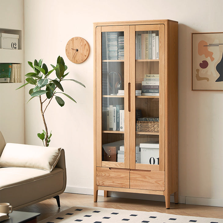 a living room with a couch and a book case