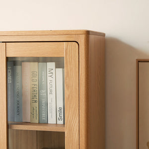 a bookshelf with several books on top of it