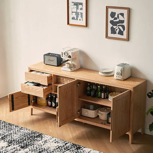 a wooden table with a microwave and a toaster on top of it