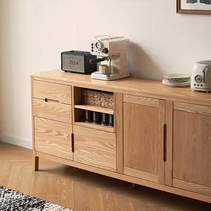 a wooden cabinet with a coffee maker on top of it