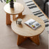 Anela natural solid cherry coffee table set with travertine-look sintered stone top in a modern organic Kiwi living room