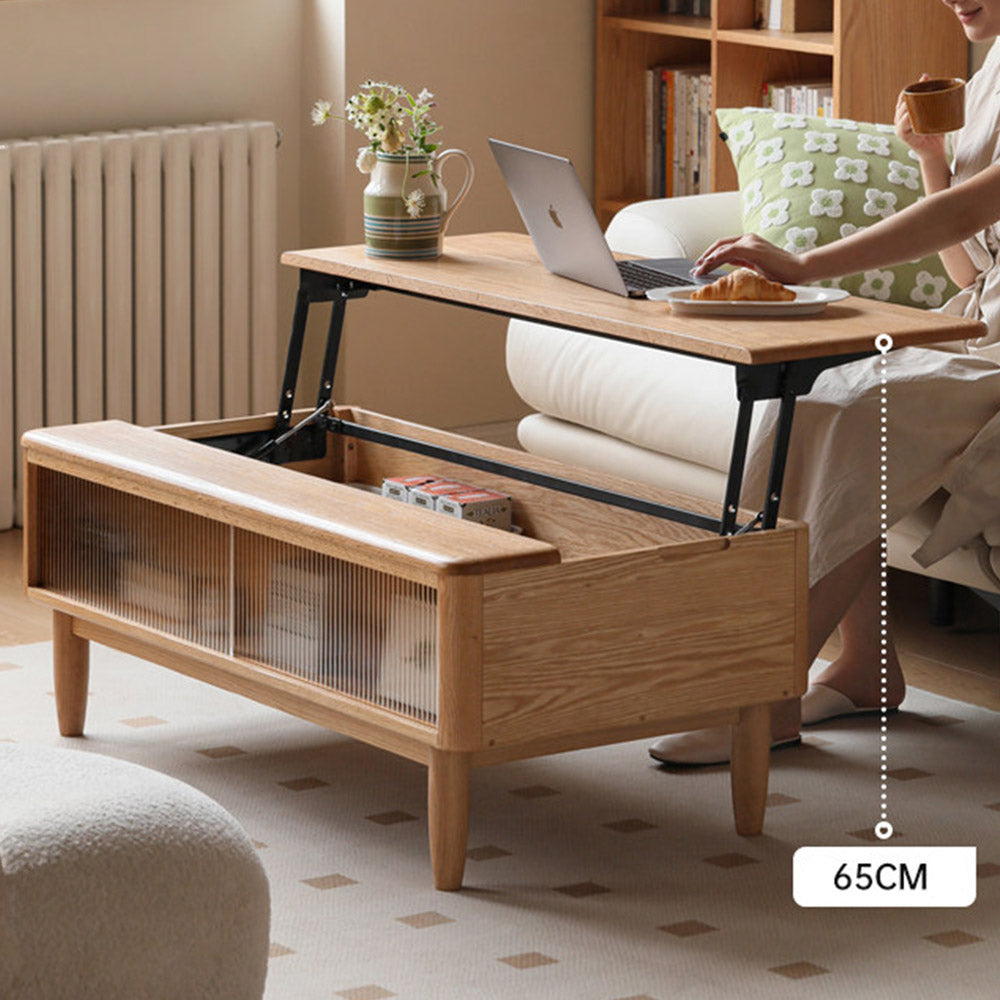 Anzio natural solid oak lift-top coffee table with hidden storage compartment and glass sliding door shelf in a modern living room