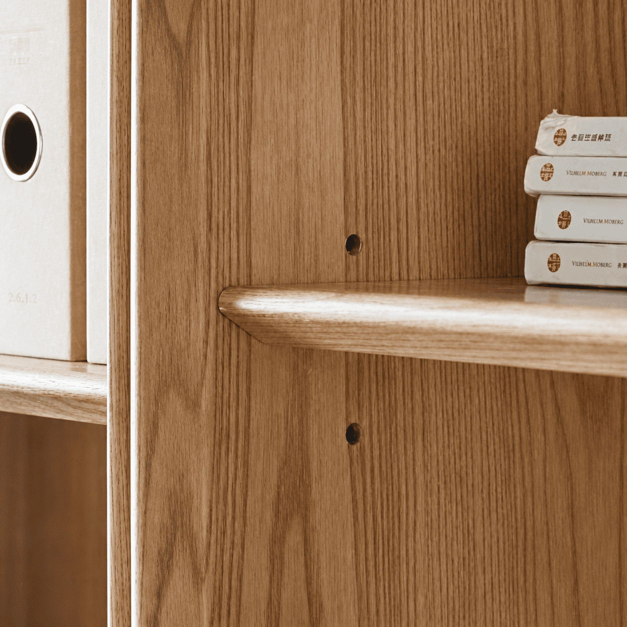 Solid ash display bookcase with adjustable shelves, natural wood grain, and fluted glass detail