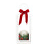 Small white Christmas LED lantern with red velvet bow, candle, pine greenery and festive red berries
