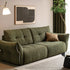 Blancas green chenille sofa with deep cushioned seating and vintage-inspired design in a modern living room.