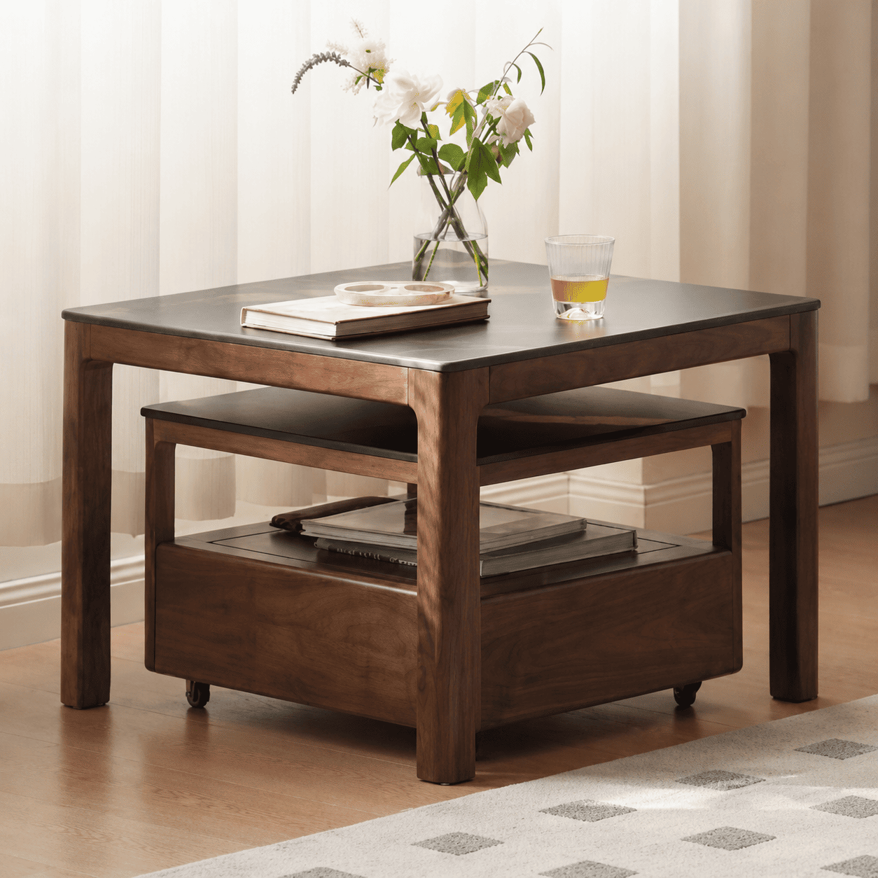 Boise walnut coffee table with black ceramic top and wheeled lower storage unit