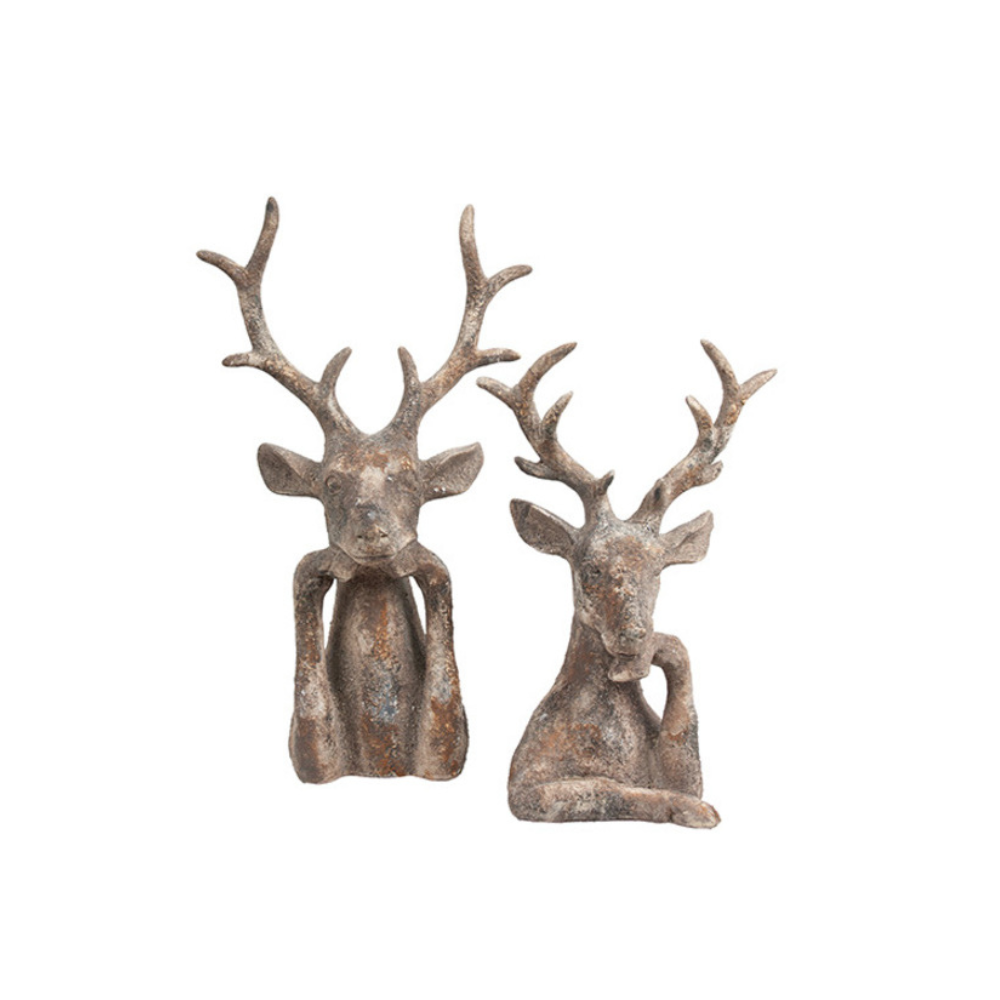 Set of two rustic caribou ornaments in aged gravel finish with detailed antlers and seated reindeer design