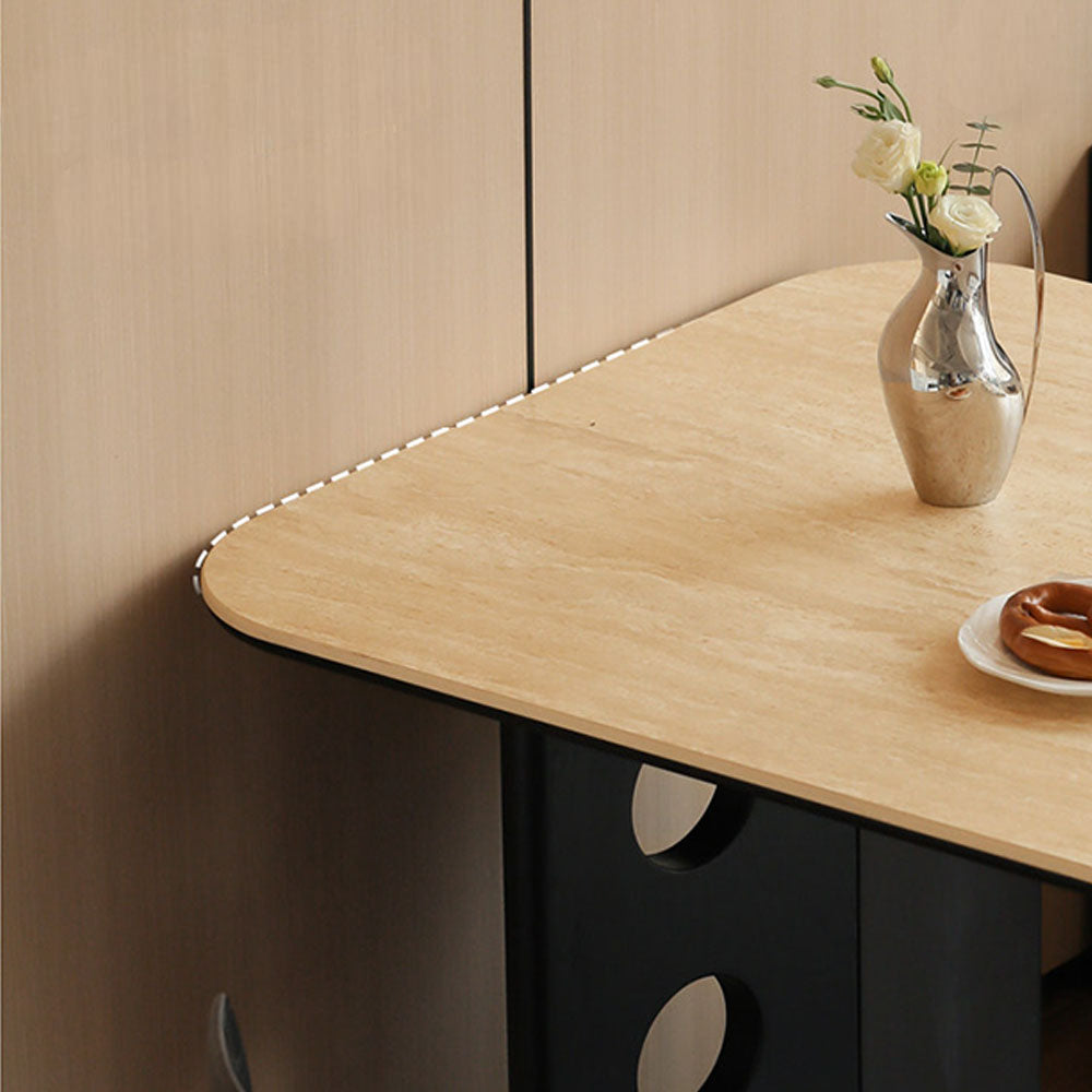 Charcoal solid oak dining table with travertine-look ceramic top and mid-century dot-detail legs, styled with dining chairs in a modern dining room.