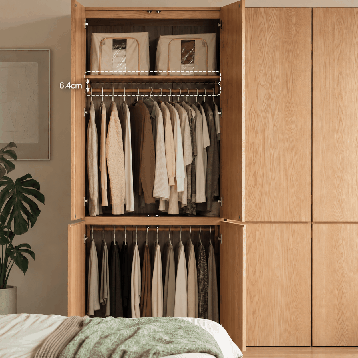Clovis natural oak wardrobe open with upper shelf, hanging rail and lower storage section