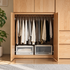 Clovis natural solid oak wardrobe interior with hanging rail and storage boxes