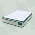 DoubleComfort Pocket Spring Mattress angled view with medium comfort label, green piping and quilted top