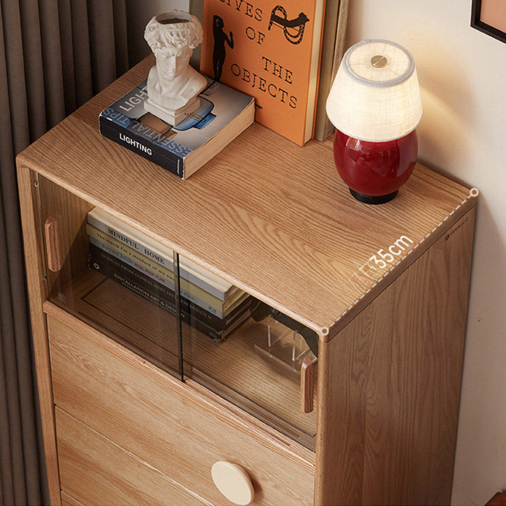 Elmas natural solid oak side cabinet with grey glass sliding door, LED lighting and drawers in a retro-inspired Kiwi interior