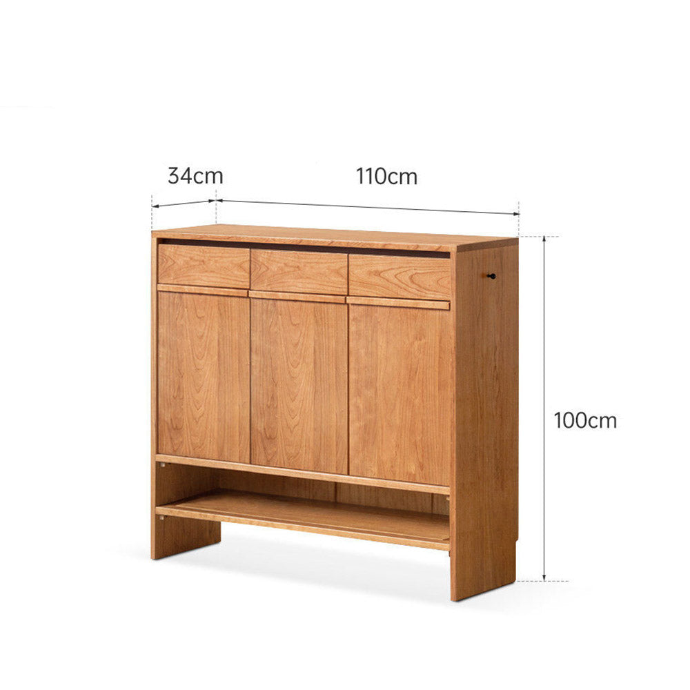 Enna natural solid cherry shoe cabinet with drawers, adjustable shoe racks, open shelves and side hooks in a hallway setting
