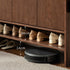 Enna natural solid walnut shoe cabinet with drawers, adjustable internal shoe racks, open shelves and side hooks in an entryway