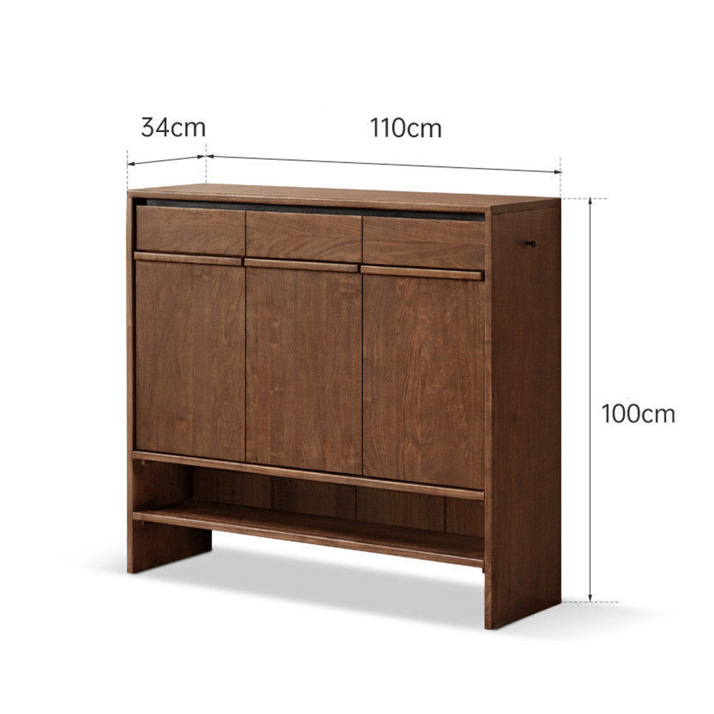 Enna natural solid walnut shoe cabinet with drawers, adjustable internal shoe racks, open shelves and side hooks in an entryway