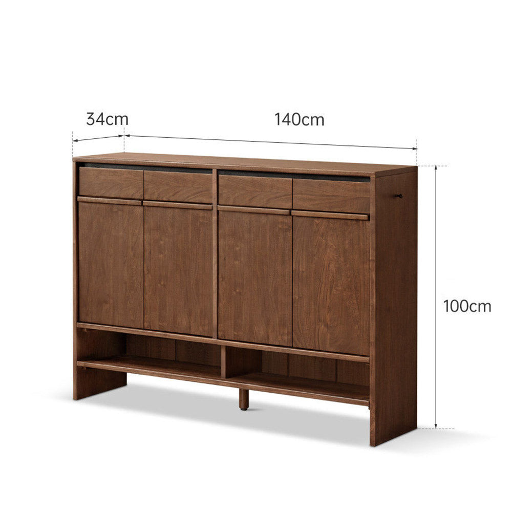 Enna natural solid walnut shoe cabinet with drawers, adjustable internal shoe racks, open shelves and side hooks in an entryway