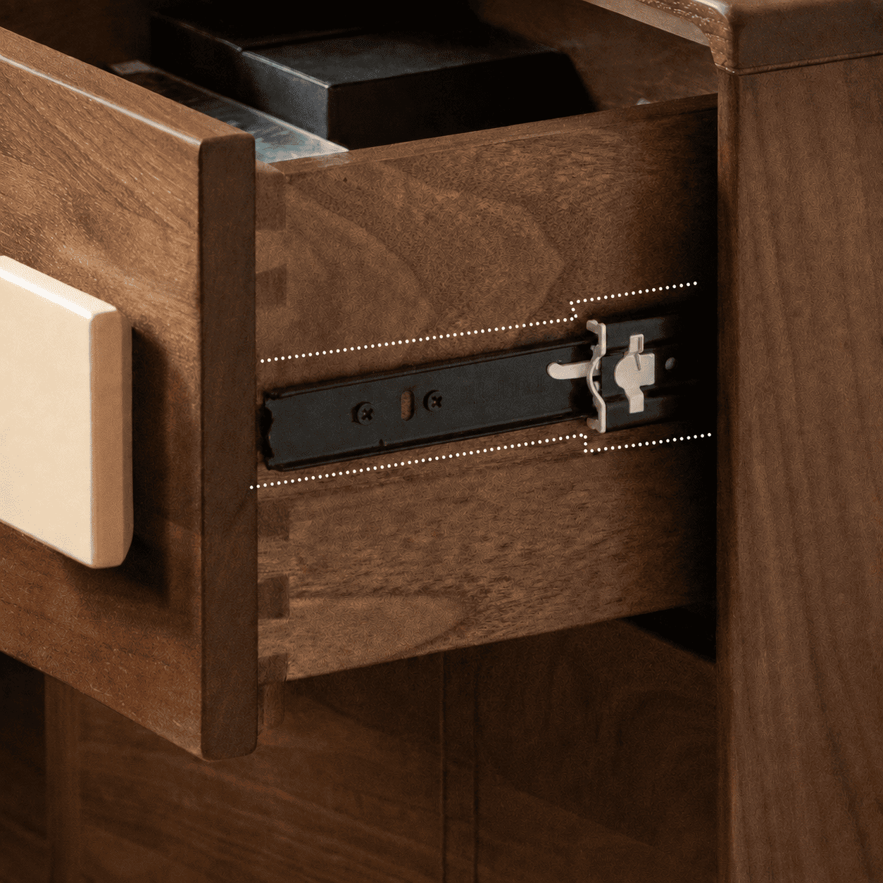 Close-up of Fontana bedside table drawer slide and solid hardwood drawer construction