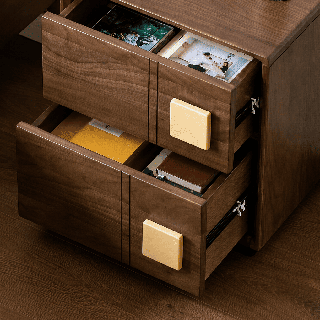 Open drawers of walnut solid hardwood bedside table storing books and small bedroom items