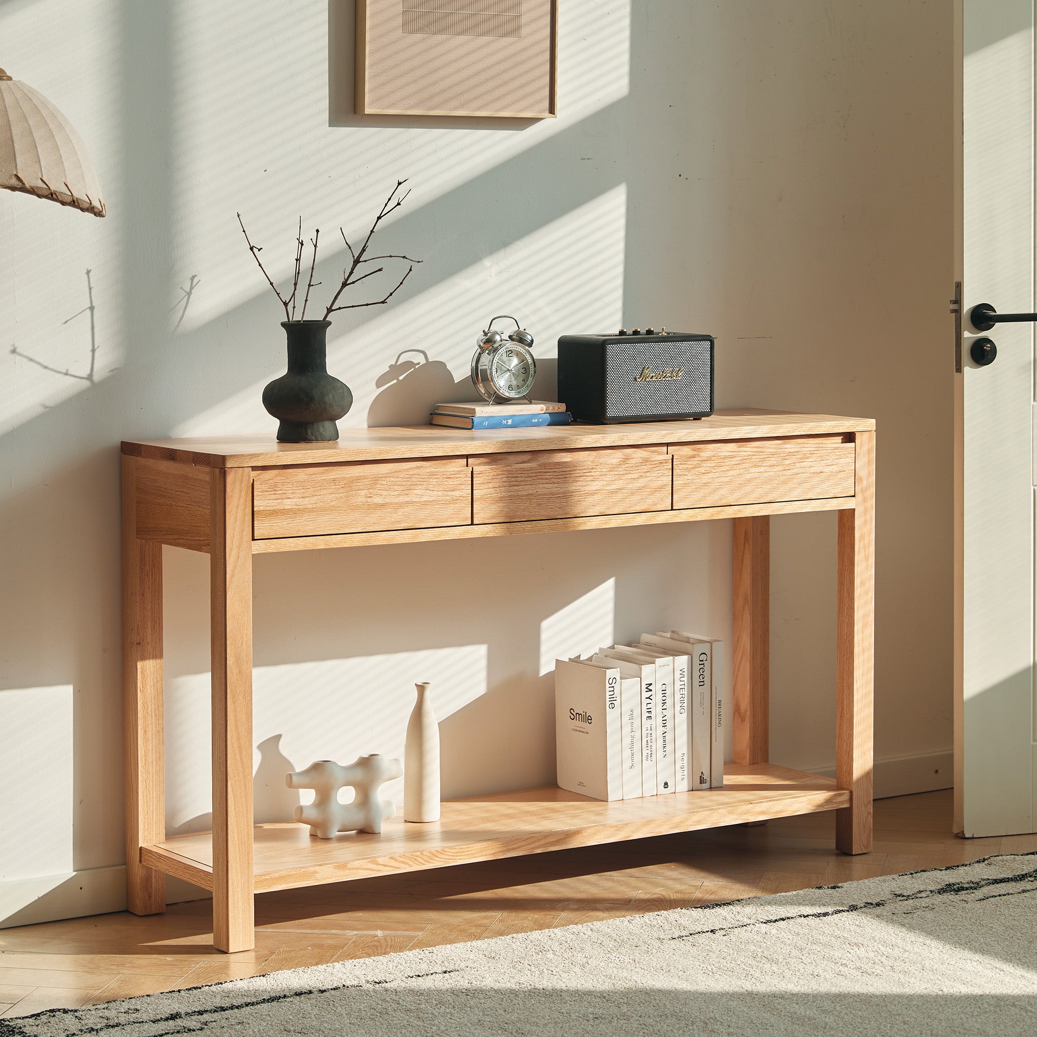 Humbie natural solid oak console table with drawers and lower shelf styled as a hallway table in a Kiwi home