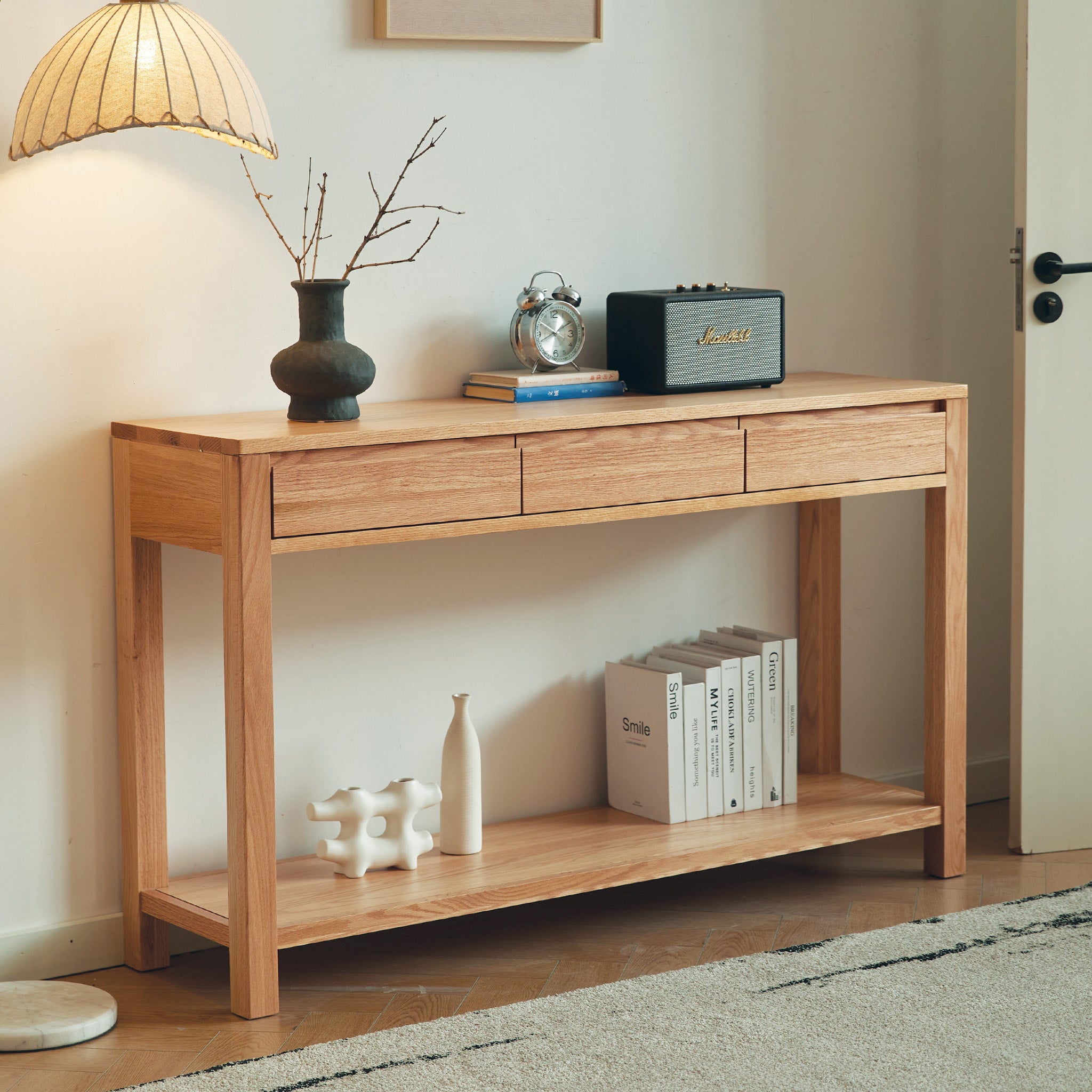 Humbie natural solid oak console table with drawers and lower shelf styled as a hallway table in a Kiwi home