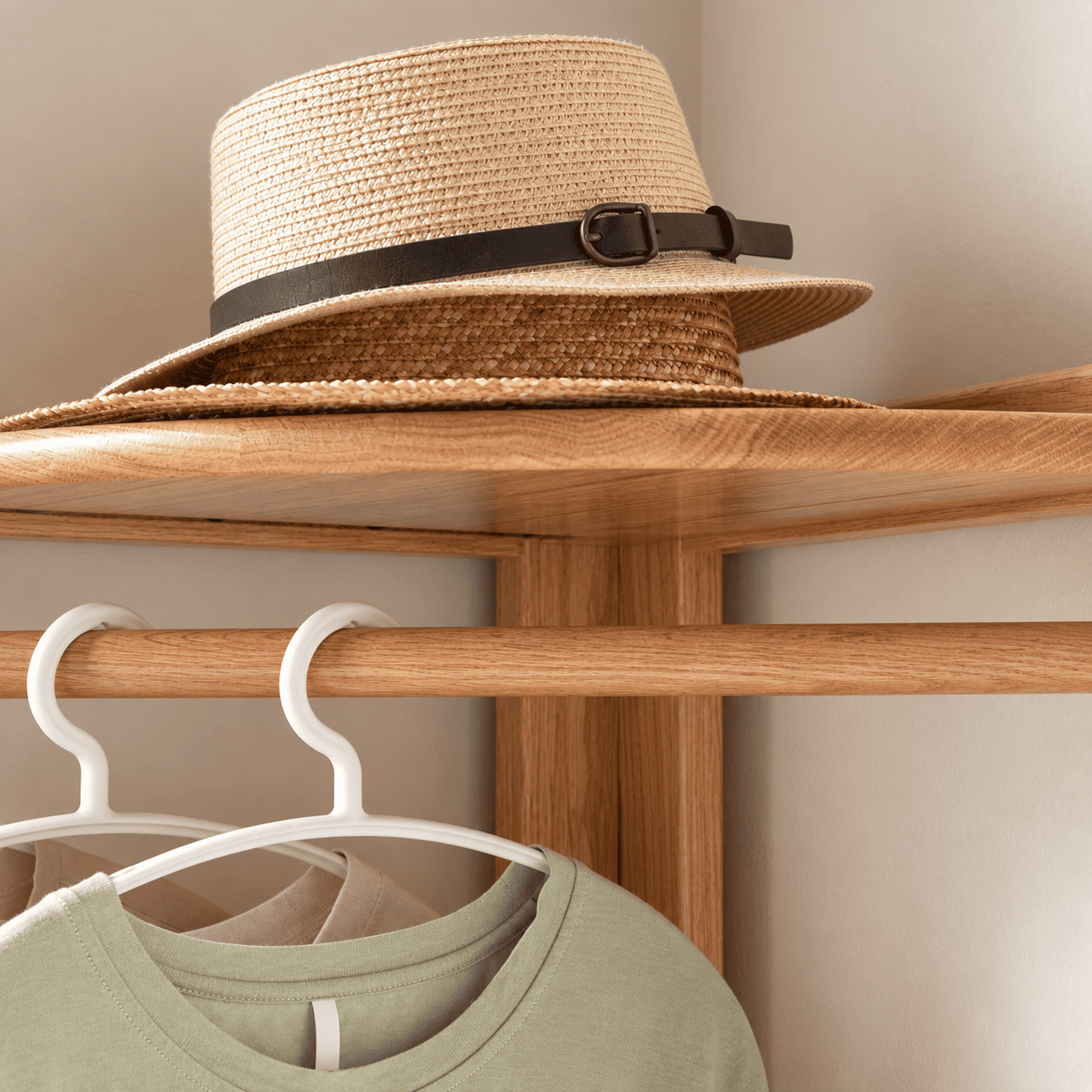 Close up of Kent natural solid oak coat rack top shelf and hanging rail detail