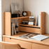 Lathum Natural Solid Beech Desktop Shelf displayed in a study corner with books, calendar, camera and desktop décor