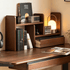 Lathum Desktop Shelf in dark wood finish styled on an office desk with books, lamp, laptop and drawer storage