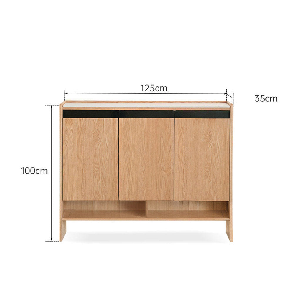 Limina natural solid oak shoe cabinet with white ceramic top, adjustable internal shoe racks and open shoe storage shelves in a hallway