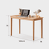 Contemporary solid oak desk with a natural wood finish and simple, streamlined silhouette