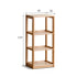 Medolla natural solid oak storage shelf with open shelving used as a bookshelf