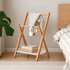Naila natural solid beech coat rack with hanging towel, headphones and storage basket