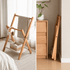 Naila foldable natural beech coat rack shown open and folded for space saving storage