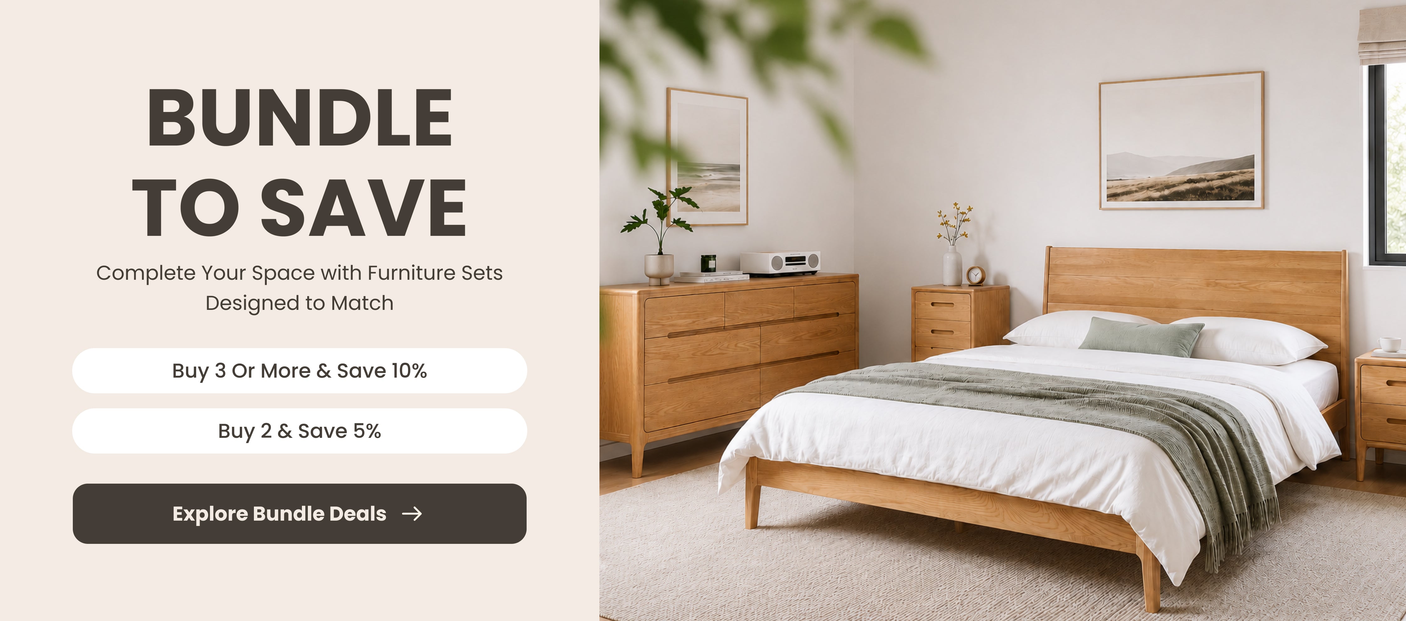 Matching solid oak bedroom furniture set with bed frame, bedside cabinets and chest of drawers in a bright modern room.