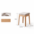 Scandinavian-style nesting stools in solid oak with soft fabric cushions and stackable storage