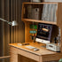 Oliveri natural solid oak desk with hutch, drawers, pegboard and glass cabinet in a home office setting