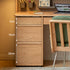 Oliveri natural solid oak desk with hutch, drawers, pegboard and glass cabinet in a home office setting