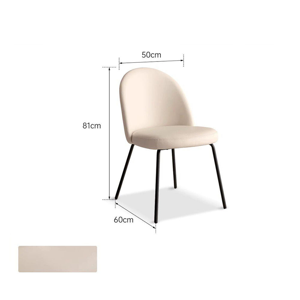Loreto faux leather dining chair with curved backrest and matte black metal legs, shown in warm white/light brown upholstery.