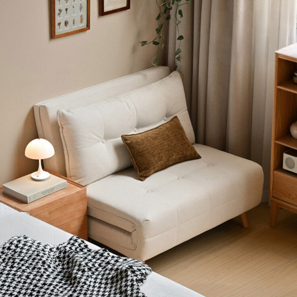 Orune compact fabric sofa bed with adjustable backrest, polyester upholstery and beech wood legs.