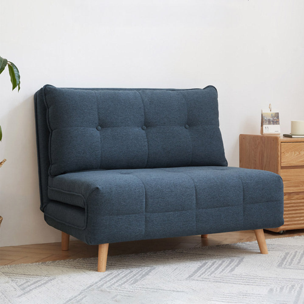 Orune compact fabric sofa bed with adjustable backrest, polyester upholstery and beech wood legs.
