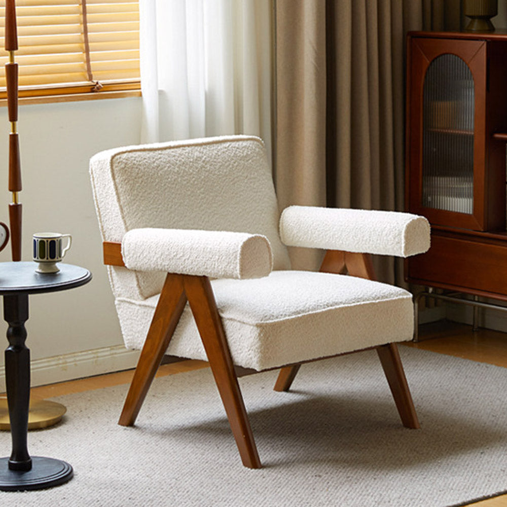 Polino faux shearling leisure sofa chair in white with warm-toned beech wood frame