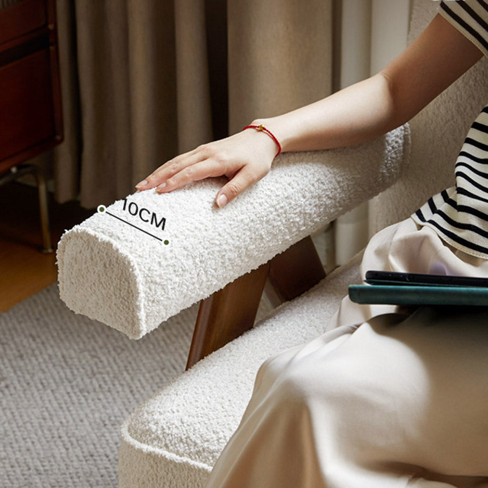 Polino faux shearling leisure sofa chair in white with warm-toned beech wood frame