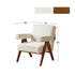 Polino faux shearling leisure sofa chair in white with warm-toned beech wood frame