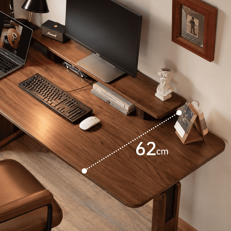 Prunus solid walnut electric desk desktop detail with monitor stand, keyboard, mouse and home office accessories