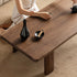 Ribera solid walnut Japandi coffee table with rounded edges and pillar legs
