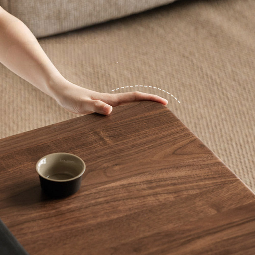 Ribera solid walnut Japandi coffee table with rounded edges and pillar legs