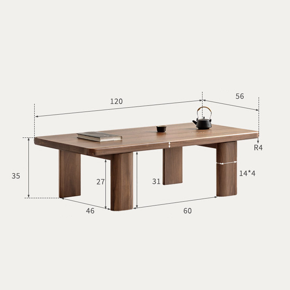Ribera solid walnut Japandi coffee table with rounded edges and pillar legs