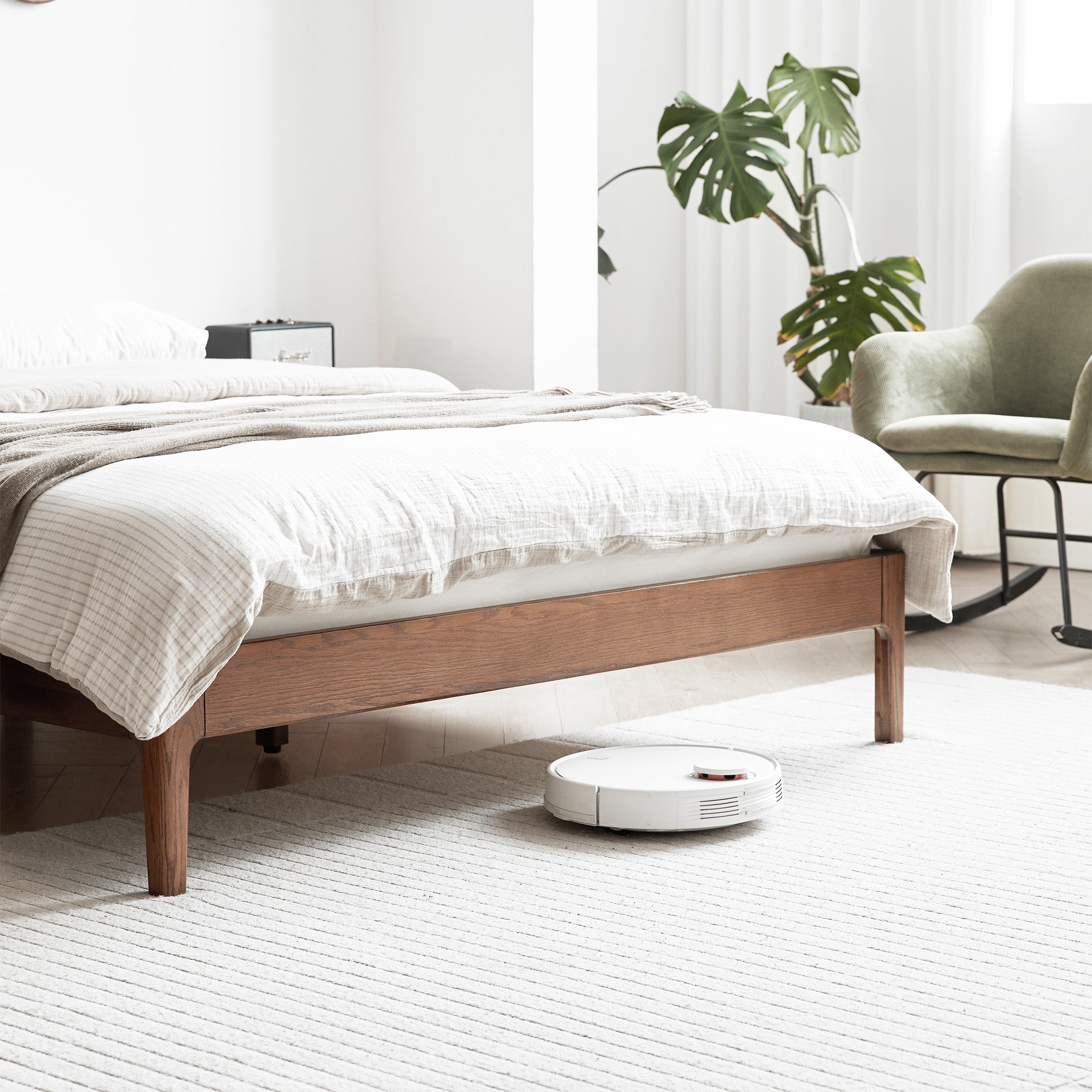 Seattle solid oak platform bed frame styled in a bright modern Kiwi bedroom