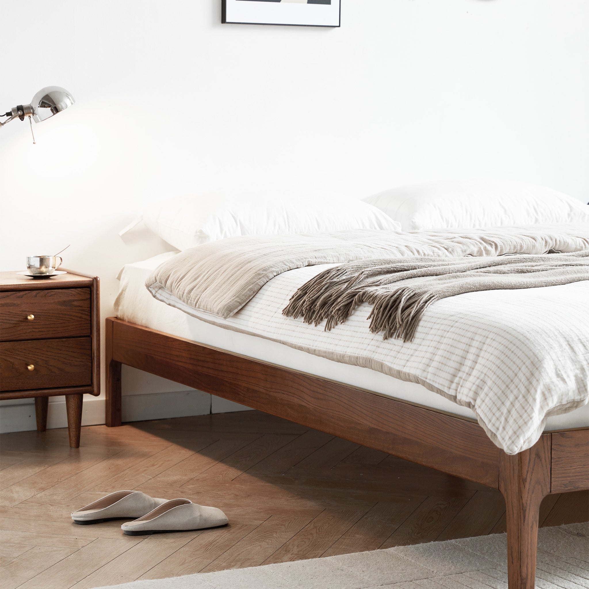Seattle solid oak platform bed frame styled in a bright modern Kiwi bedroom
