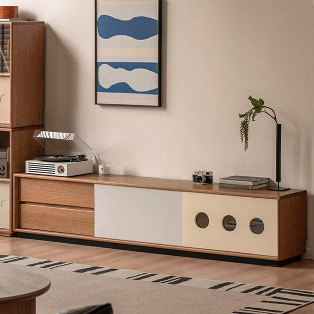 Tonnac solid cherry entertainment unit with drawers, glass shelving and modern retro design in a Kiwi living room